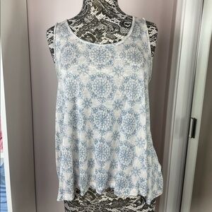 We The Free cream and blue sleeveless top in size medium.